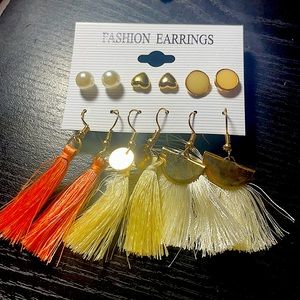 Brand new, never worn earring. Three pairs studs and 3 pairs hanging